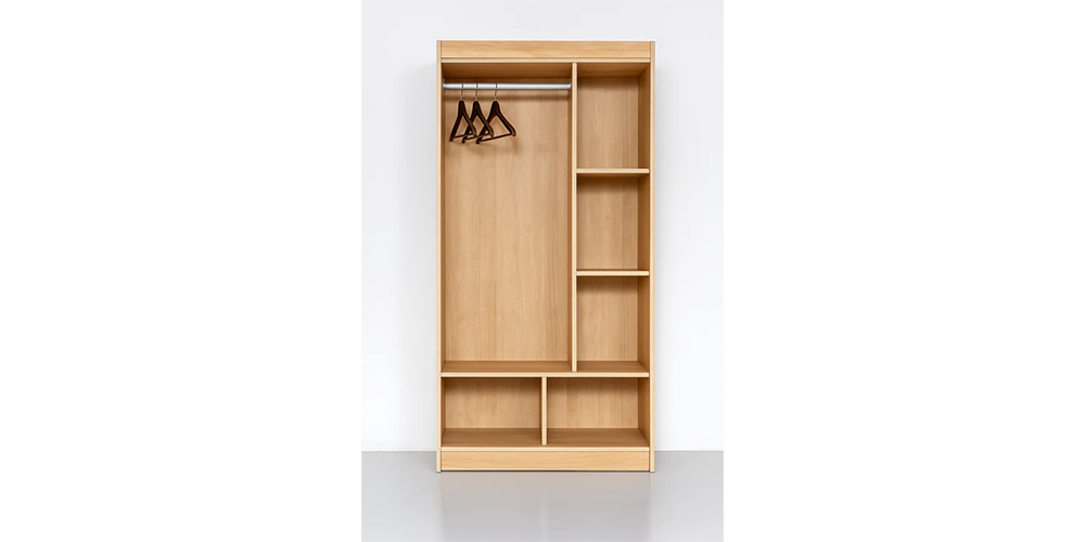 Wooden wardrobe with open doors on a white background